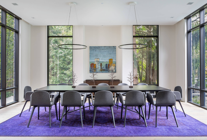 Bringing a burst of warmth and texture to our dining room this red patchwork Turkish rug ties the space together with its rich hues and unique design