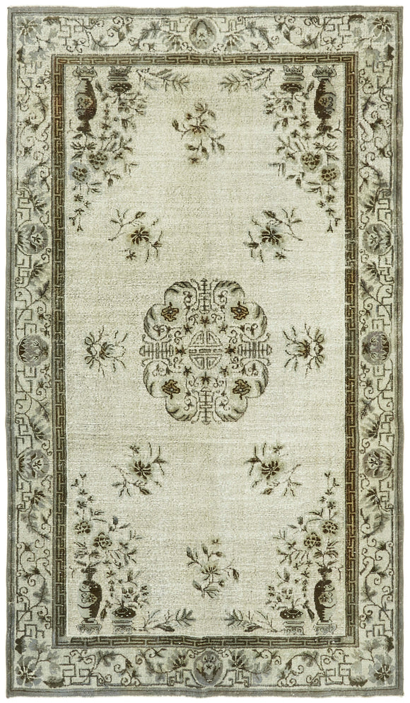 6' 2'' x 10' 5'' Turkish Hand Carved Rug