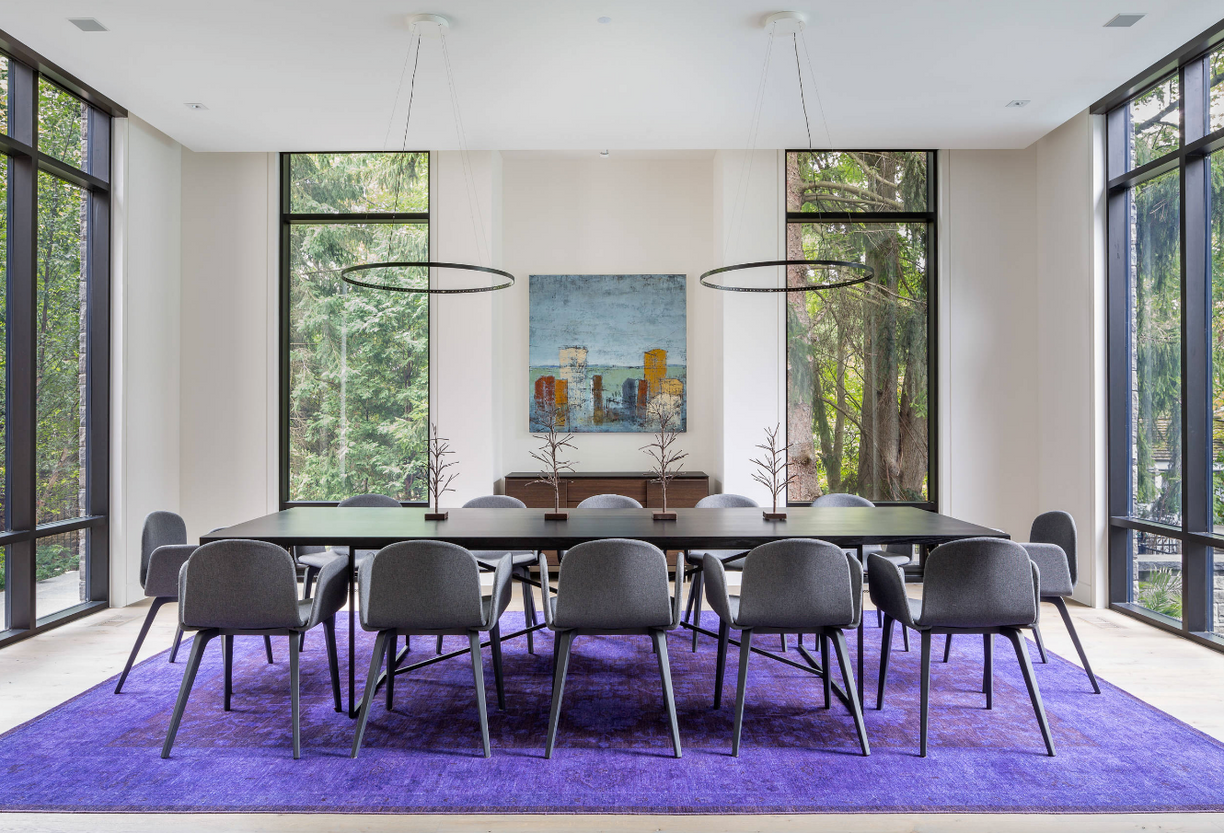 Bringing a burst of warmth and texture to our dining room this red patchwork Turkish rug ties the space together with its rich hues and unique design