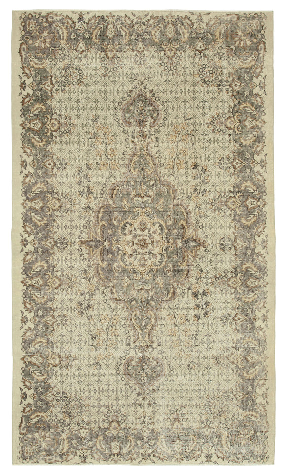 5' 4'' x 9' 3'' Hand-Knotted Vintage Turkish Rug