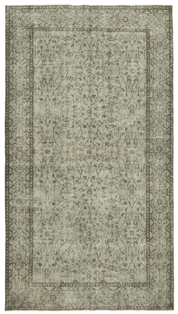 5' 4'' x 9' 6'' Handmade Vintage Overdyed Rug