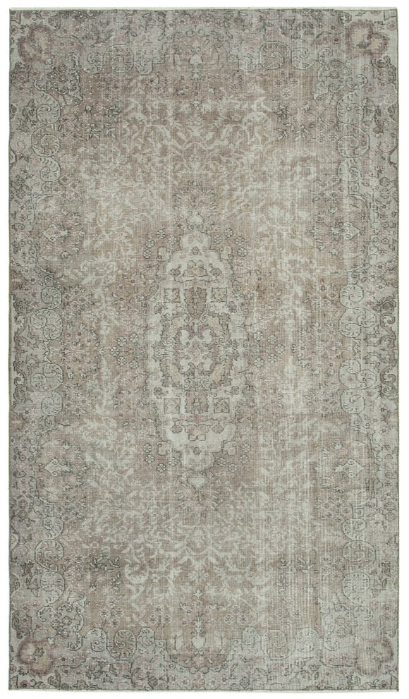 5' 3'' x 9' 1'' Handmade Vintage Overdyed Rug
