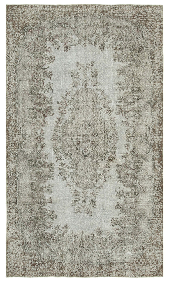 5' 6'' x 9' 5'' Handmade Vintage Overdyed Rug