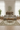 Beige vintage Turkish area rug 6x10 feet in Japandi minimalist living room