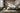 5x9 beige vintage Turkish handmade rug in boho bedroom interior